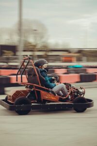 A Kid Riding a Go-Kart 