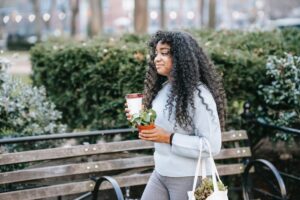 A Woman Walking at a Park