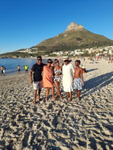 Modisha with family at Camps Bay Beach