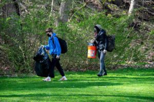People cleaning a park